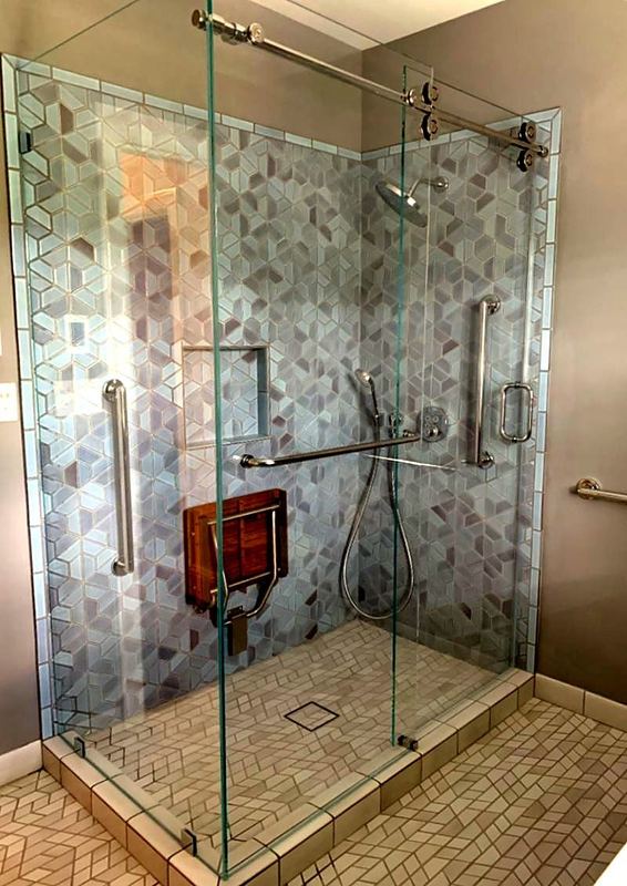 Sliding glass shower doors by Shower Enclosures by George